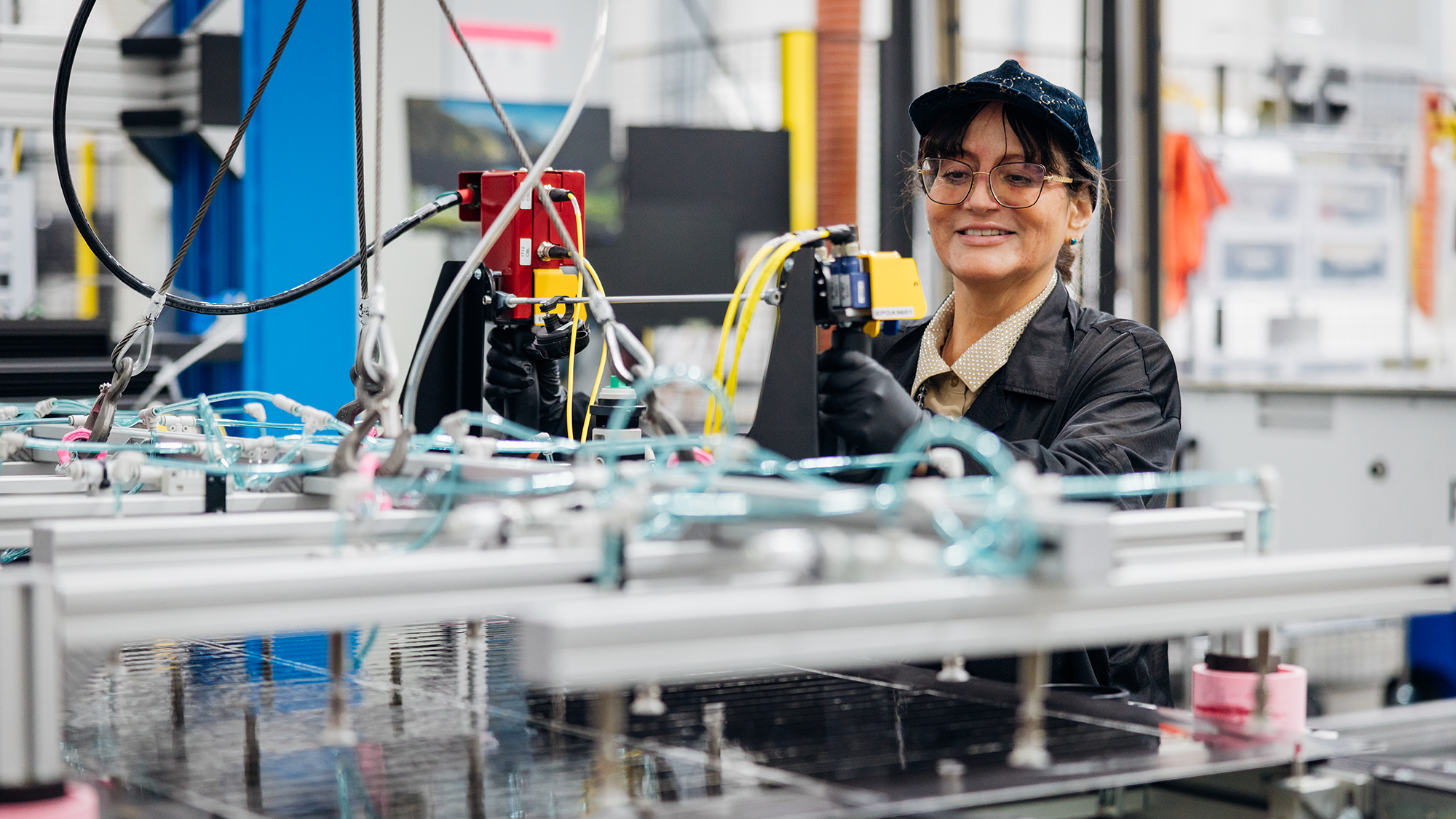 A technician working on Amazon Leo material